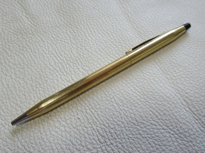 Set of three Cross Classic Century metal ballpoint pens on white background