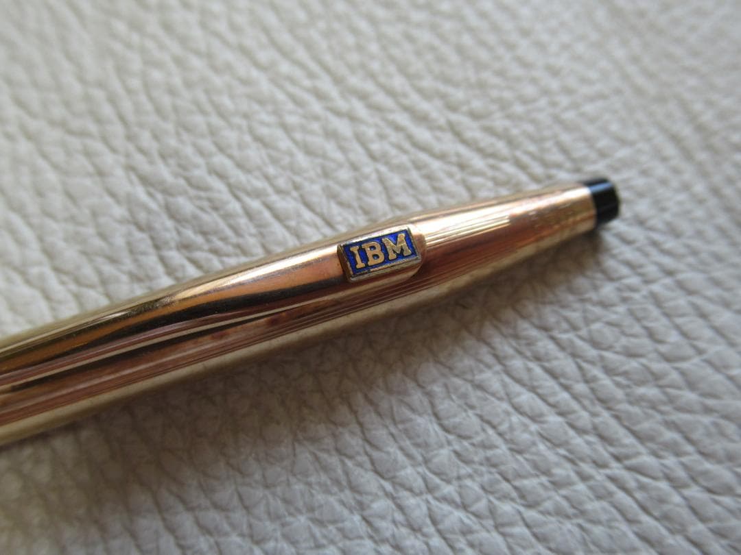 Set of three Cross Classic Century metal ballpoint pens on white background