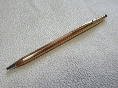Set of three Cross Classic Century metal ballpoint pens on white background