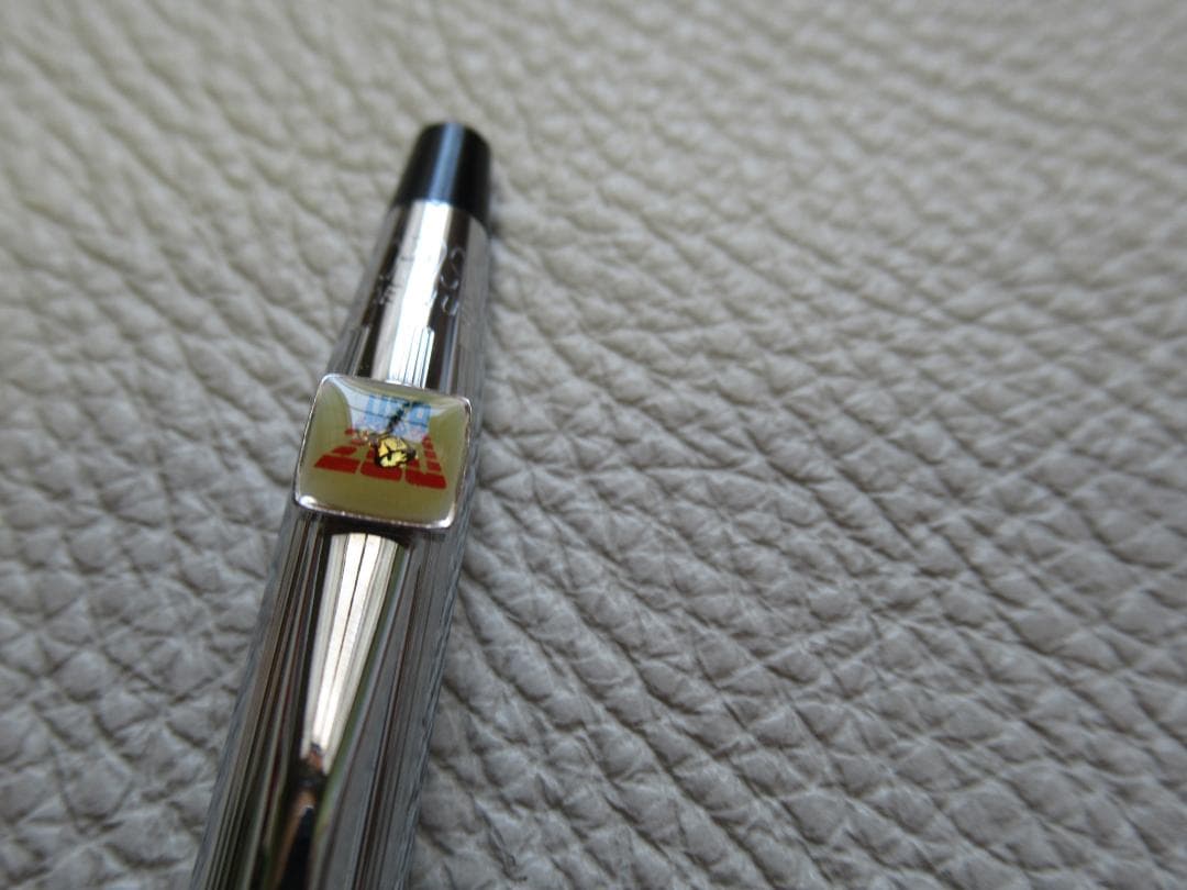 Set of three Cross Classic Century metal ballpoint pens on white background