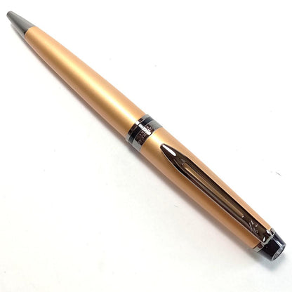 Waterman Expert Metallic Gold RT Ballpoint Pen with sleek metallic finish and black grip, 142mm long