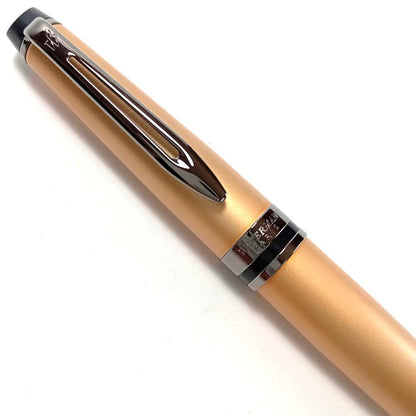 Waterman Expert Metallic Gold RT Ballpoint Pen with sleek metallic finish and black grip, 142mm long