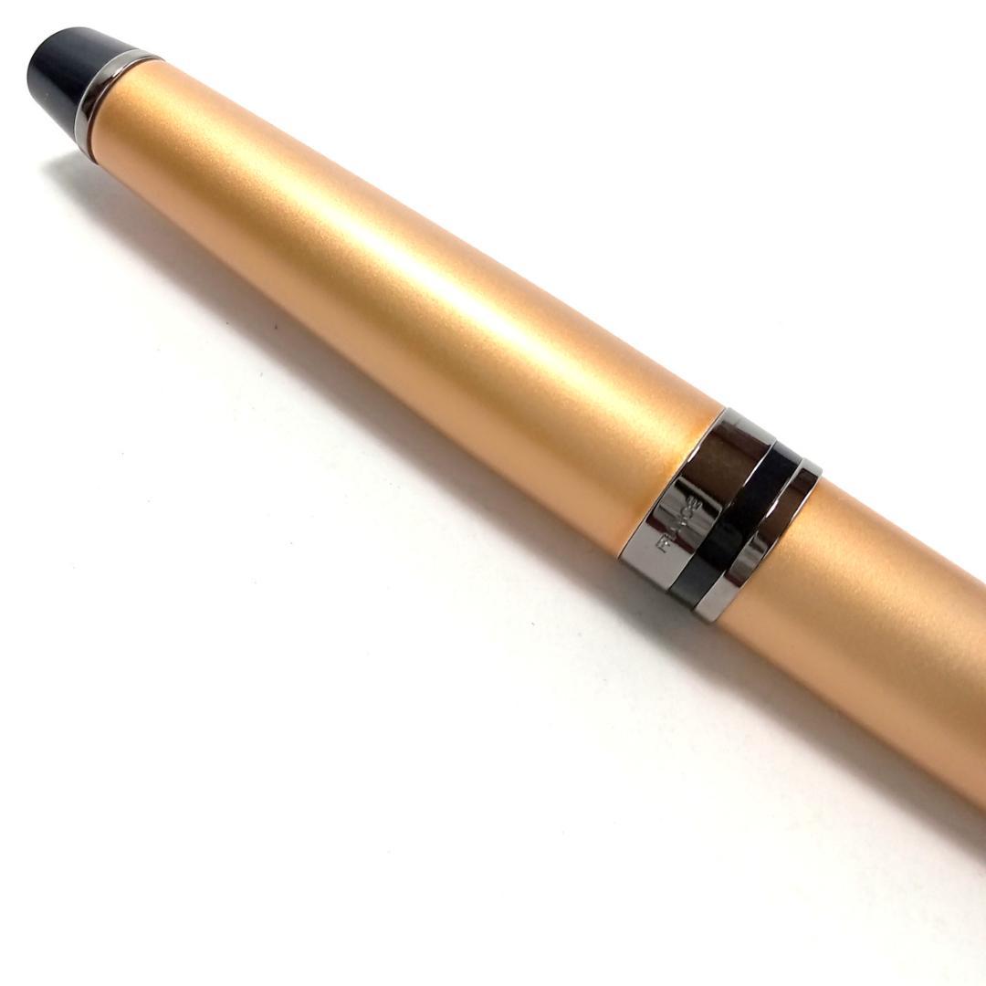 Waterman Expert Metallic Gold RT Ballpoint Pen with sleek metallic finish and black grip, 142mm long