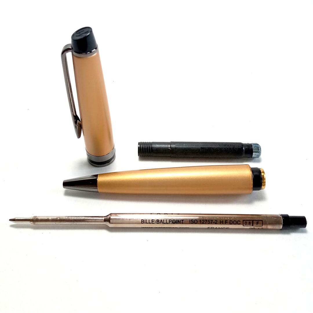 Waterman Expert Metallic Gold RT Ballpoint Pen with sleek metallic finish and black grip, 142mm long