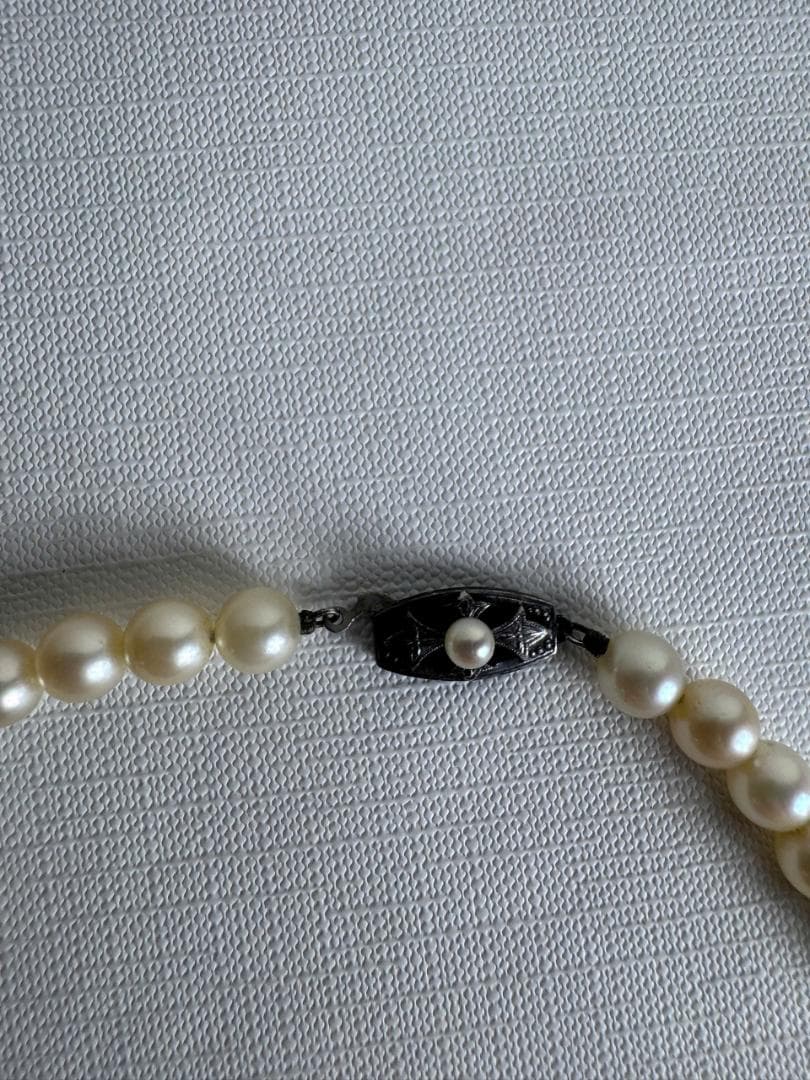 Close-up of Mikimoto Akoya Pearl Necklace with 7mm white pearls and 43cm length