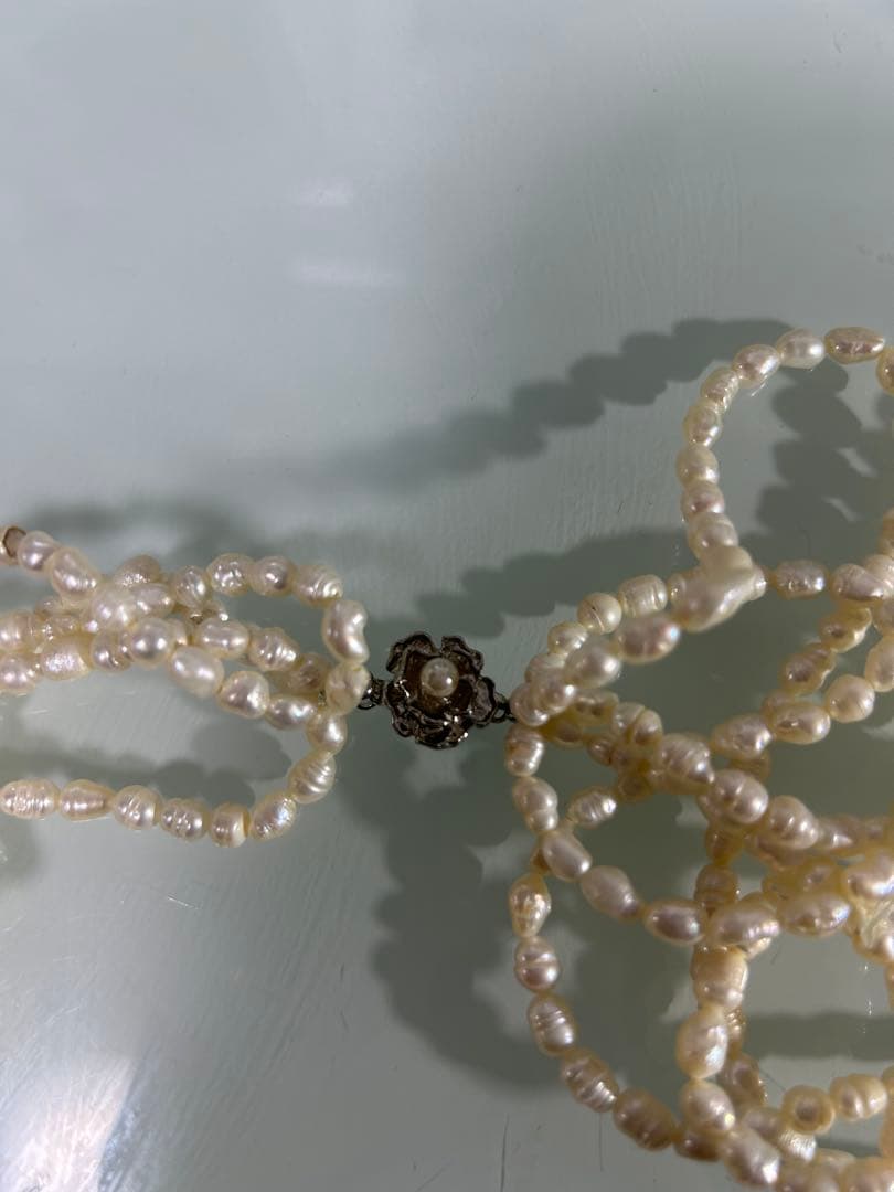 Mikimoto 5-strand freshwater pearl necklace with 5 to 6 mm pearls, approximately 58 cm long, made in Japan