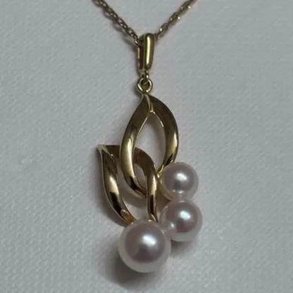 Mikimoto K18 baby pearl pendant necklace featuring a delicate pearl on a fine gold chain weighing 4.3 grams