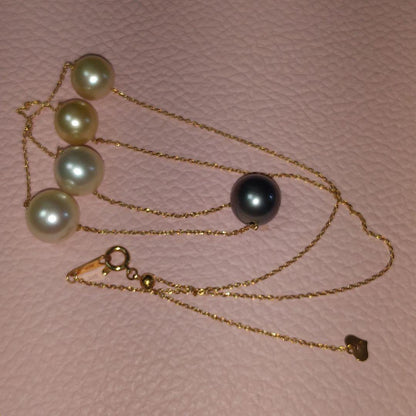 K18 Akoya pearl station necklace with large 10 mm Akoya pearls and a Tahitian pearl top on a 50 cm chain