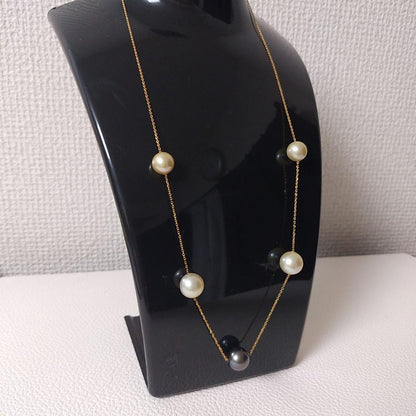 K18 Akoya pearl station necklace with large 10 mm Akoya pearls and a Tahitian pearl top on a 50 cm chain