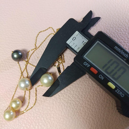 K18 Akoya pearl station necklace with large 10 mm Akoya pearls and a Tahitian pearl top on a 50 cm chain