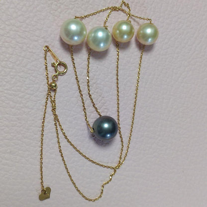 K18 Akoya pearl station necklace with large 10 mm Akoya pearls and a Tahitian pearl top on a 50 cm chain
