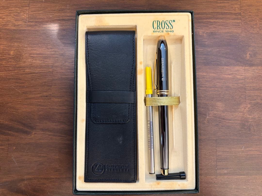 CROSS ballpoint pen with Northwest Airlines logo in dedicated leather case and replacement ink refill