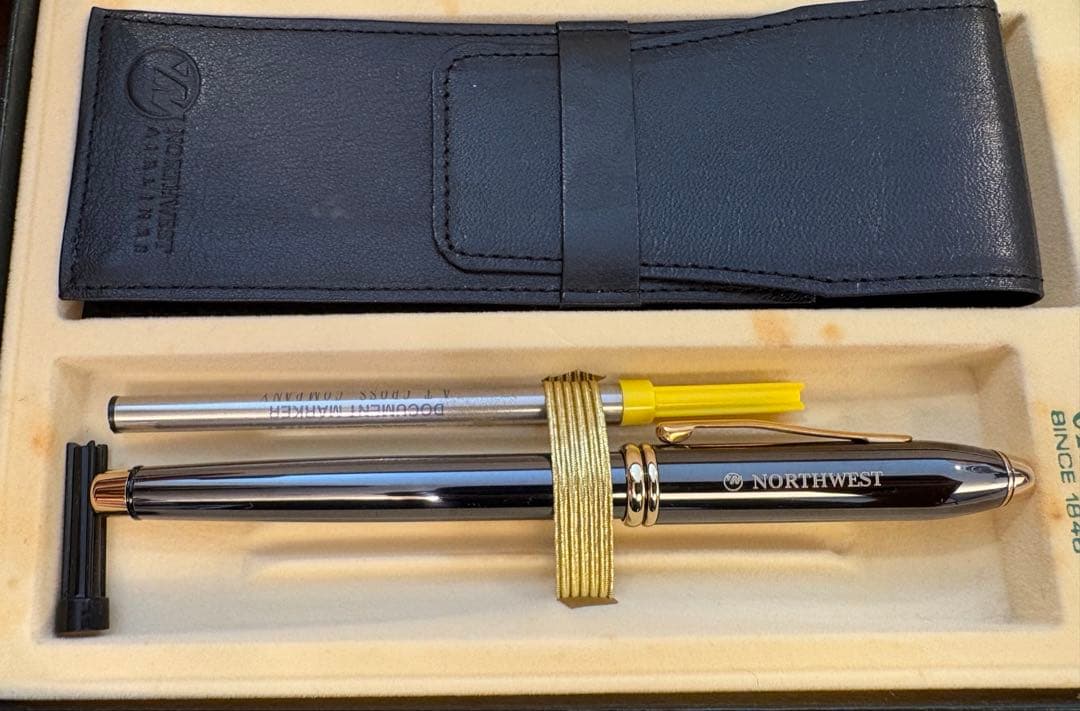 CROSS ballpoint pen with Northwest Airlines logo in dedicated leather case and replacement ink refill