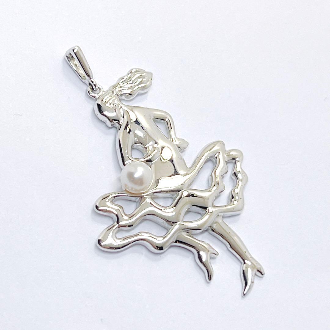 Mikimoto baby pearl pendant necklace with ballerina dance motif in silver featuring a 3.9 mm pearl