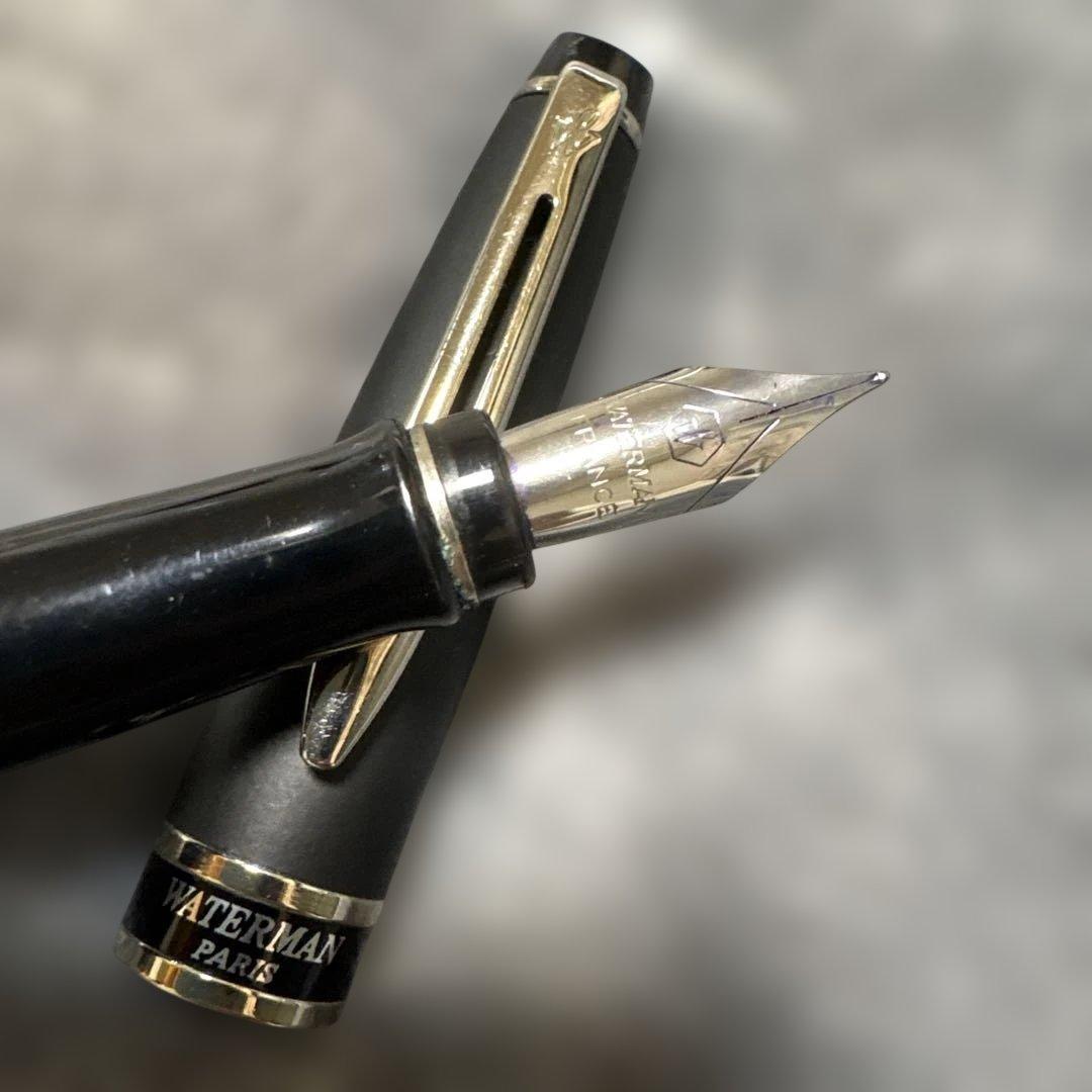 WATERMAN PARIS black fountain pen with stainless steel tip shown on white background