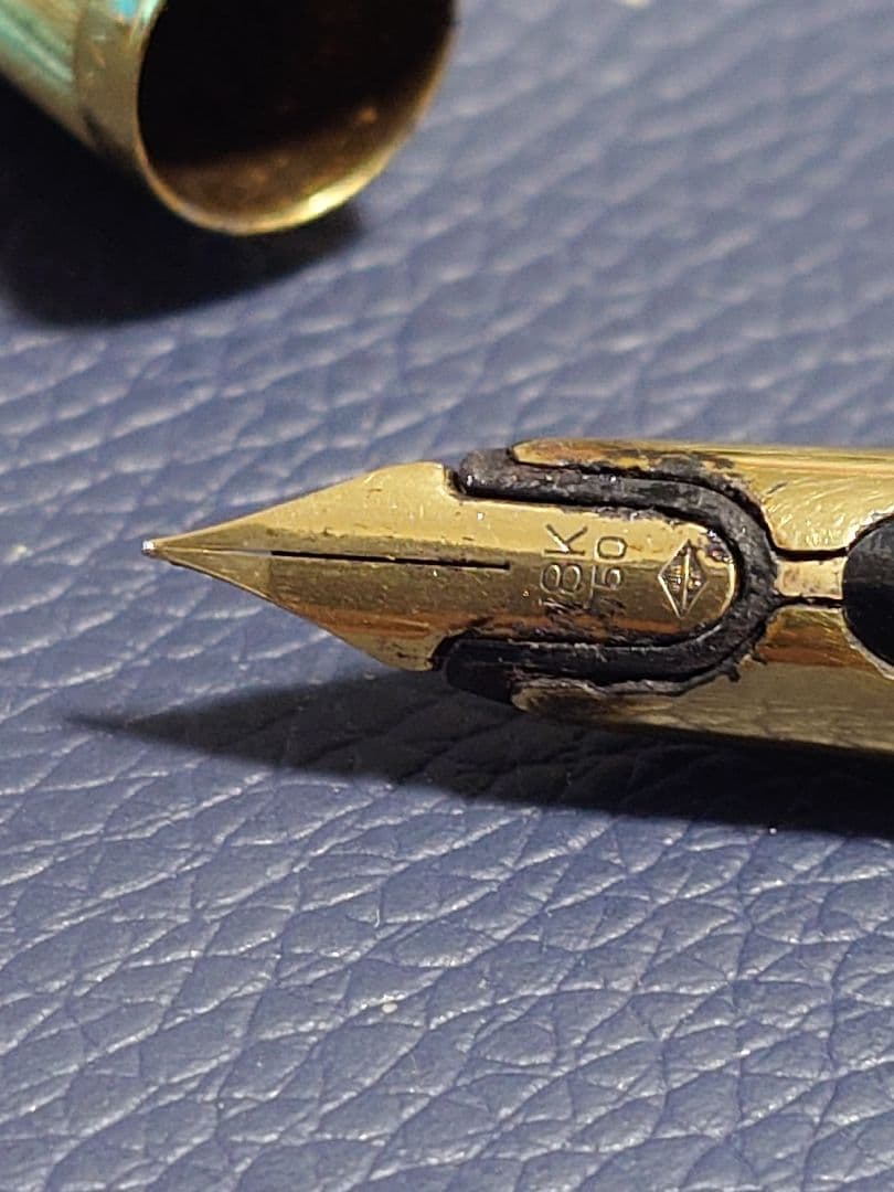 Used Waterman C/F fountain pen with 18K nib showing plating peeling and no cartridge included