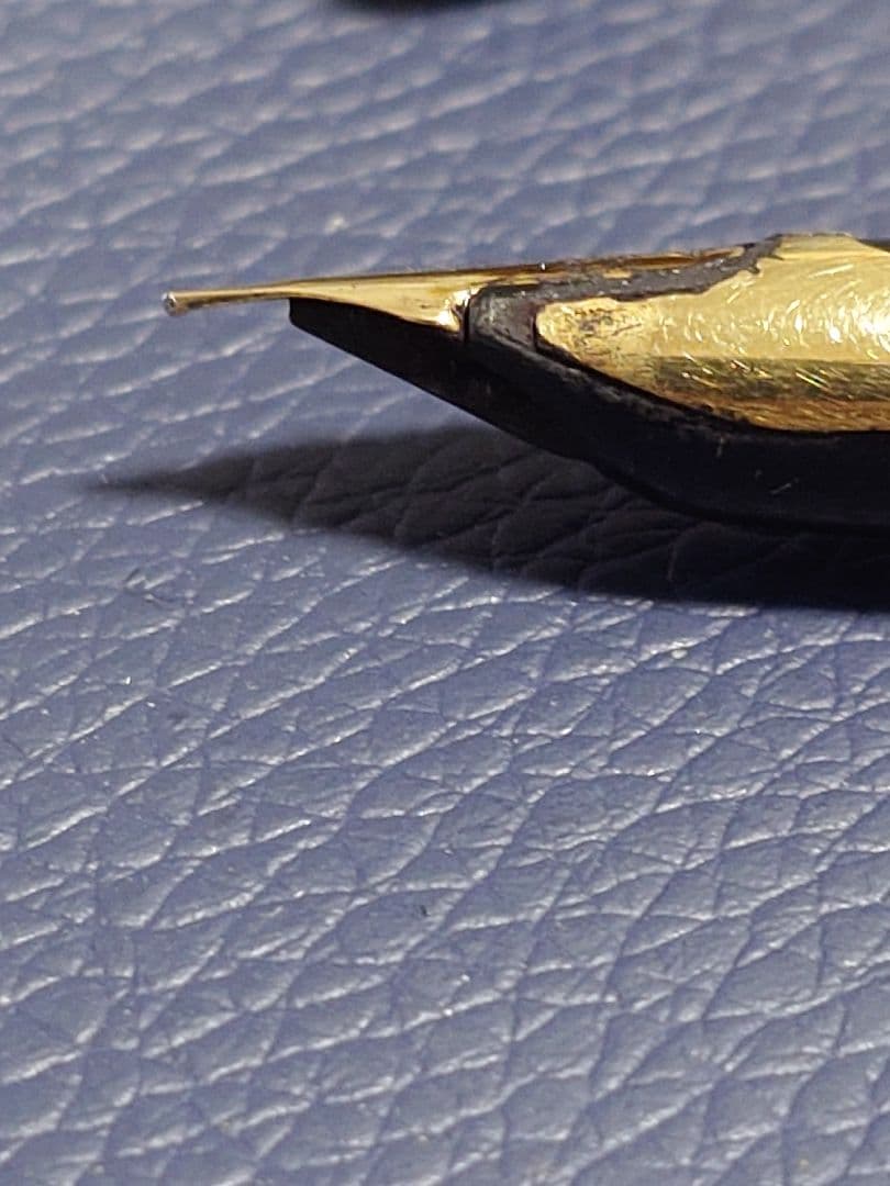 Used Waterman C/F fountain pen with 18K nib showing plating peeling and no cartridge included