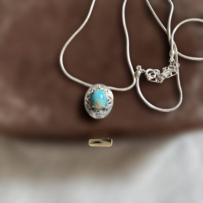 Azagato Turquoise Silver Necklace with adjustable 44-40 cm length showcasing turquoise stones and silver chain