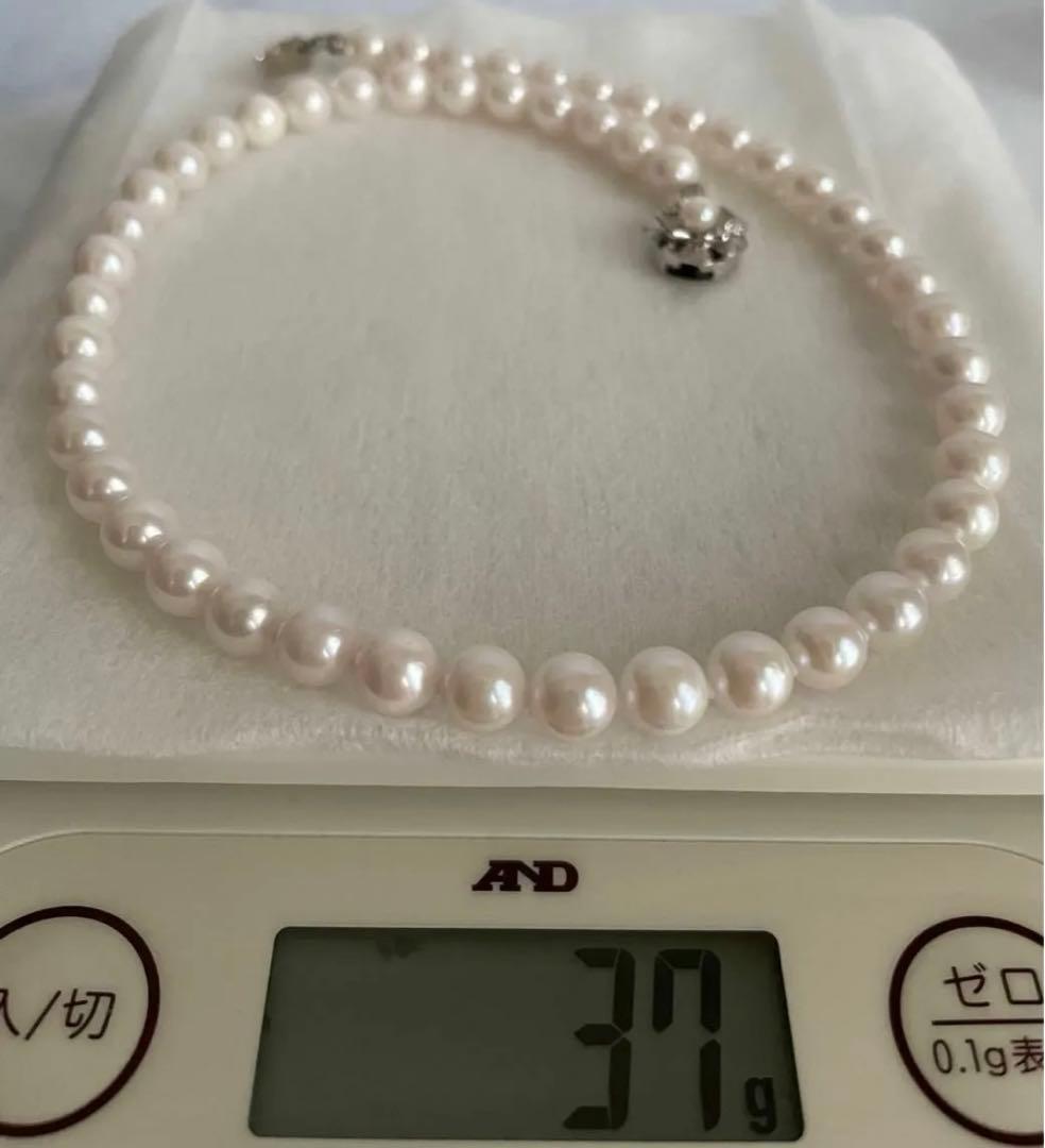 Akoya pearl necklace 8mm with matching 8.5mm pearl earrings in 14K white gold all knot finish