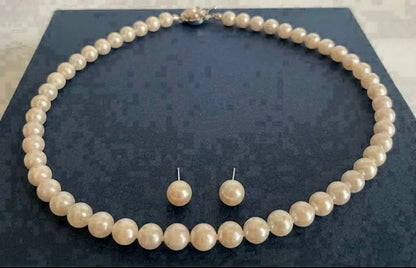 Akoya pearl necklace 8mm with matching 8.5mm pearl earrings in 14K white gold all knot finish