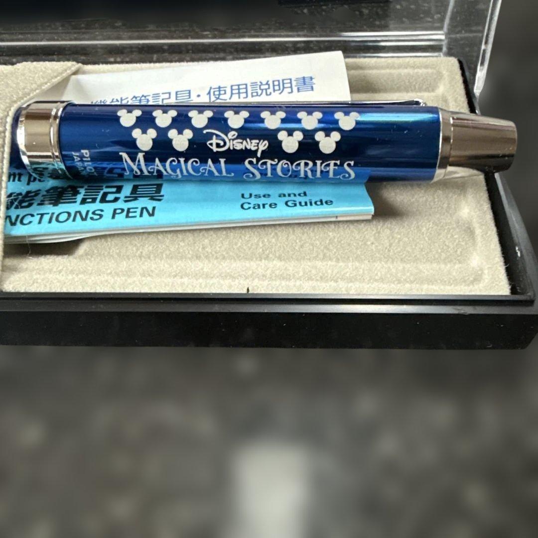 Disney PILOT Magical Stories ballpoint pen in blue with Mickey design including black and red ink, pencil, and eraser