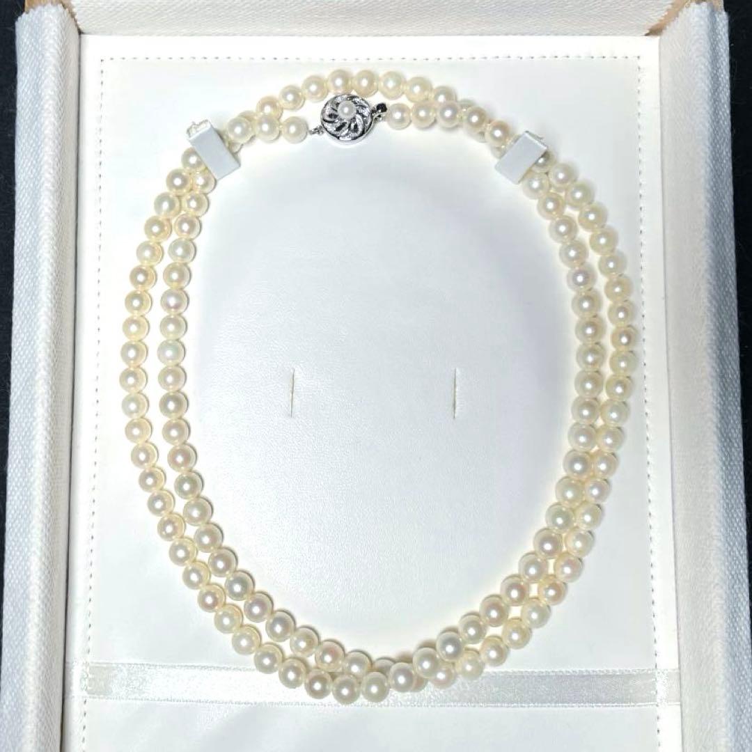Akoya long pearl necklace with round 6.5-7.0mm white pearls on silver chain, 82cm length