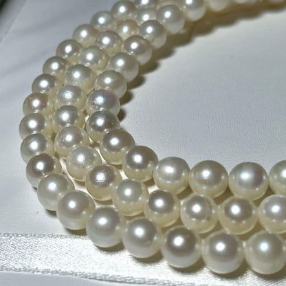 Akoya long pearl necklace with round 6.5-7.0mm white pearls on silver chain, 82cm length