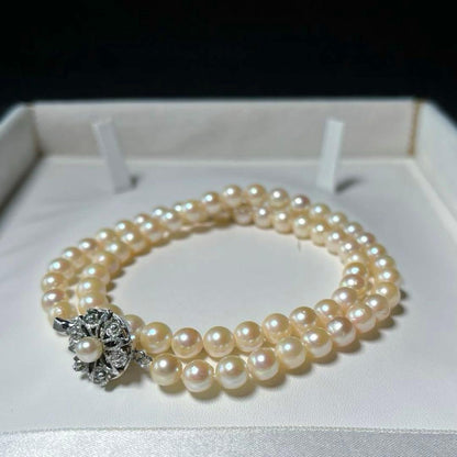 Akoya Pearl Teri Makii Necklace with 6.1 to 6.4 mm round white pearls and silver clasp