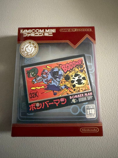 Nintendo Famicom Mini Collection Box with 10 software titles including Zelda showing signs of wear
