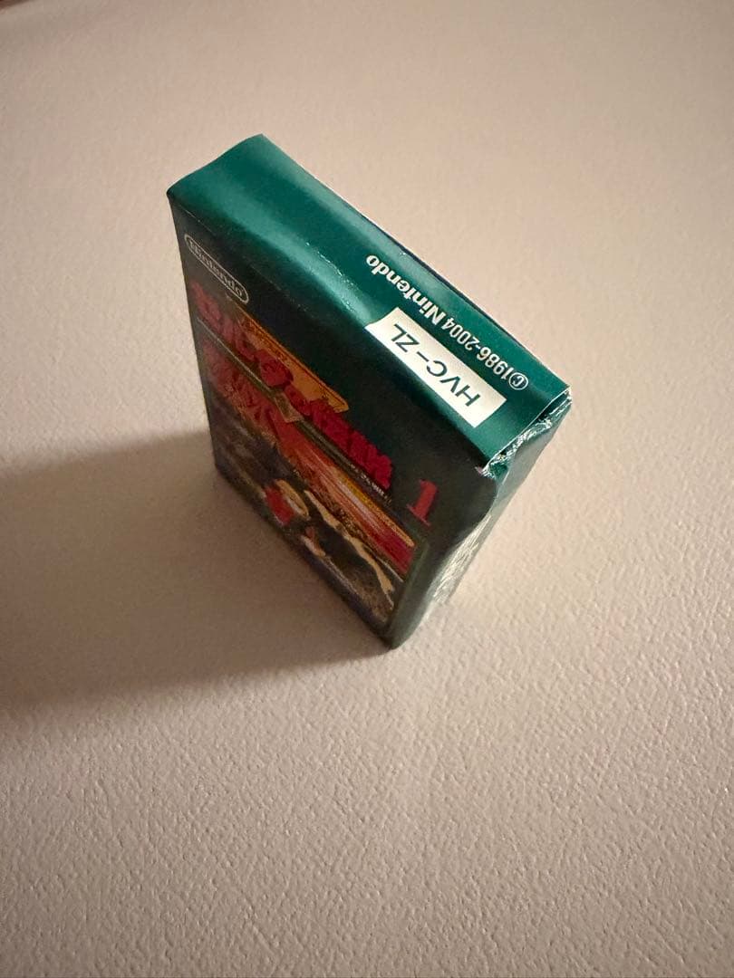 Nintendo Famicom Mini Collection Box with 10 software titles including Zelda showing signs of wear