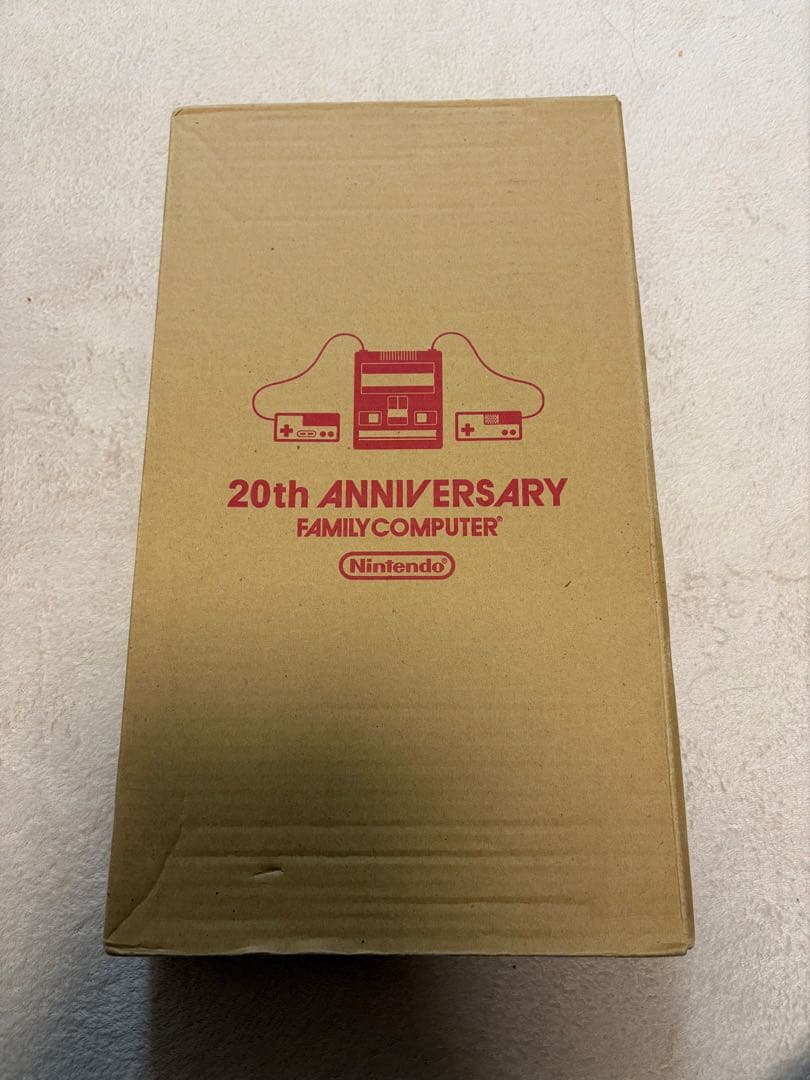 Nintendo Famicom Mini Collection Box with 10 software titles including Zelda showing signs of wear