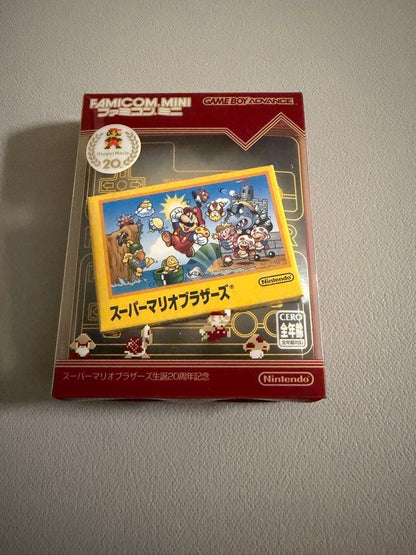 Nintendo Famicom Mini Collection Box with 10 software titles including Zelda showing signs of wear