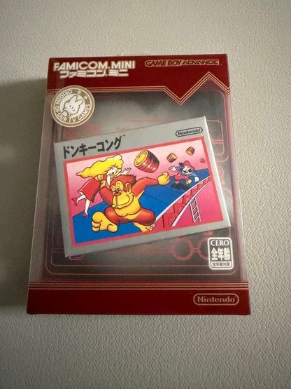 Nintendo Famicom Mini Collection Box with 10 software titles including Zelda showing signs of wear