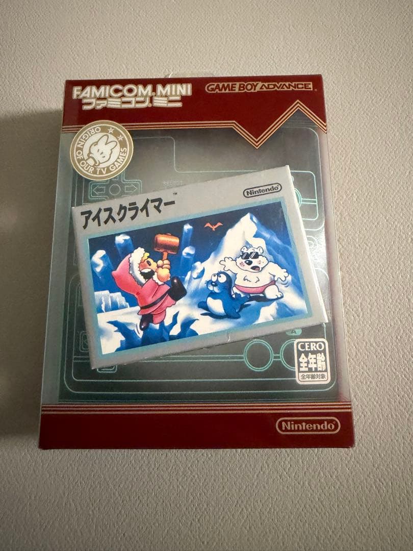 Nintendo Famicom Mini Collection Box with 10 software titles including Zelda showing signs of wear