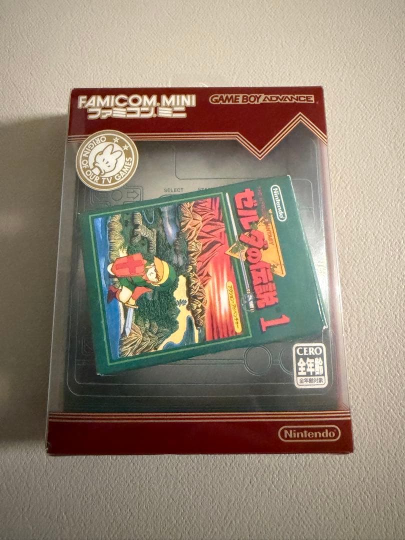 Nintendo Famicom Mini Collection Box with 10 software titles including Zelda showing signs of wear