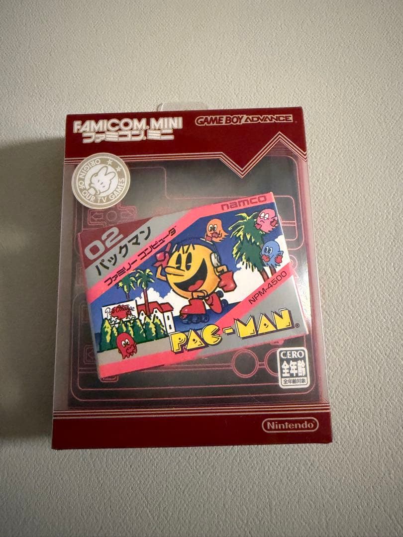 Nintendo Famicom Mini Collection Box with 10 software titles including Zelda showing signs of wear