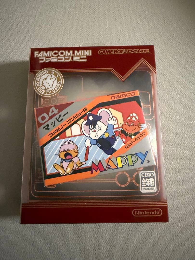 Nintendo Famicom Mini Collection Box with 10 software titles including Zelda showing signs of wear