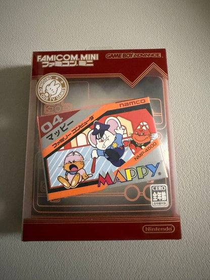 Nintendo Famicom Mini Collection Box with 10 software titles including Zelda showing signs of wear