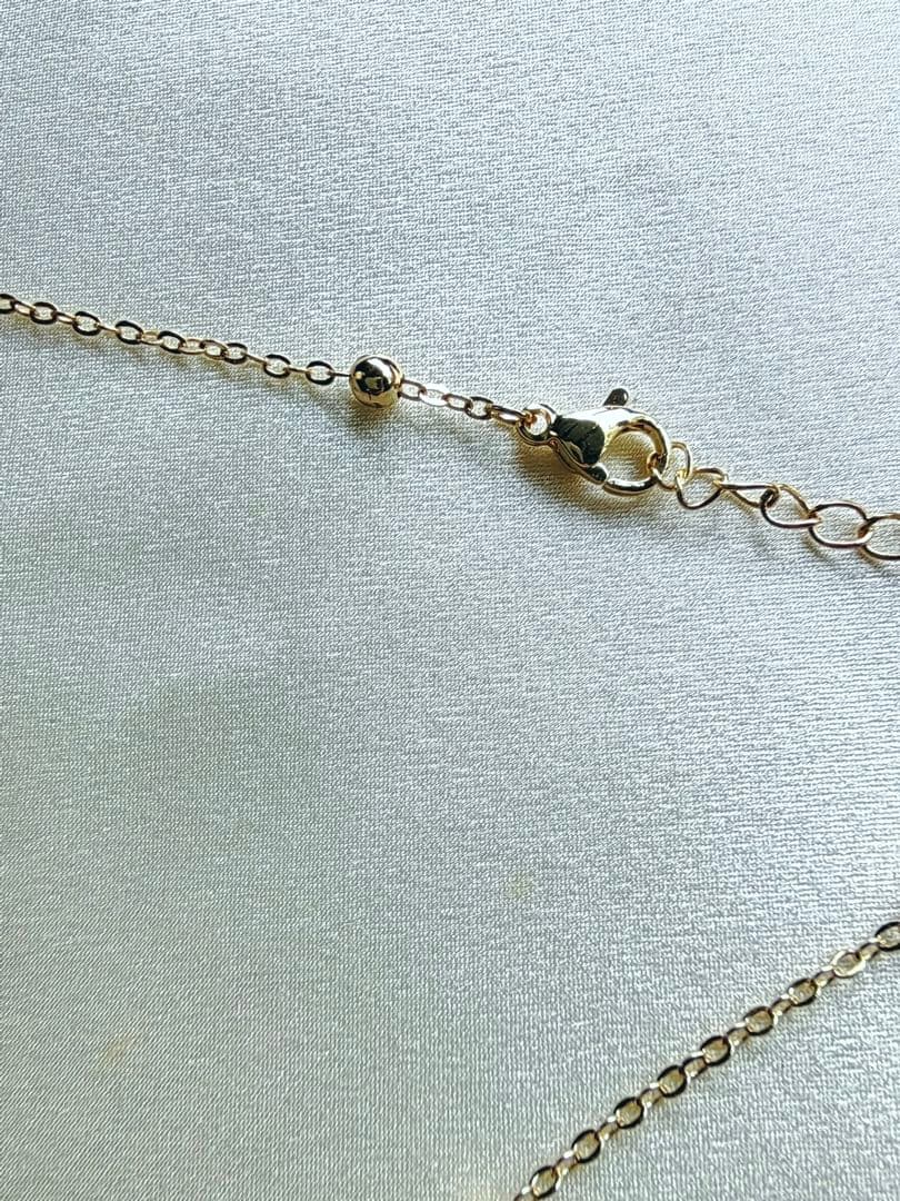 White pearl necklace with white mother-of-pearl butterfly pendant and 5.7mm freshwater pearls on 46cm chain
