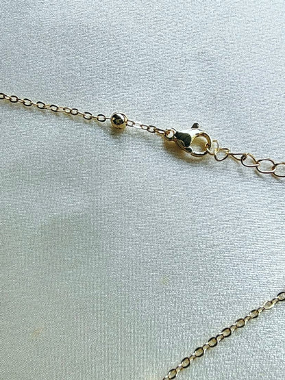 White pearl necklace with white mother-of-pearl butterfly pendant and 5.7mm freshwater pearls on 46cm chain