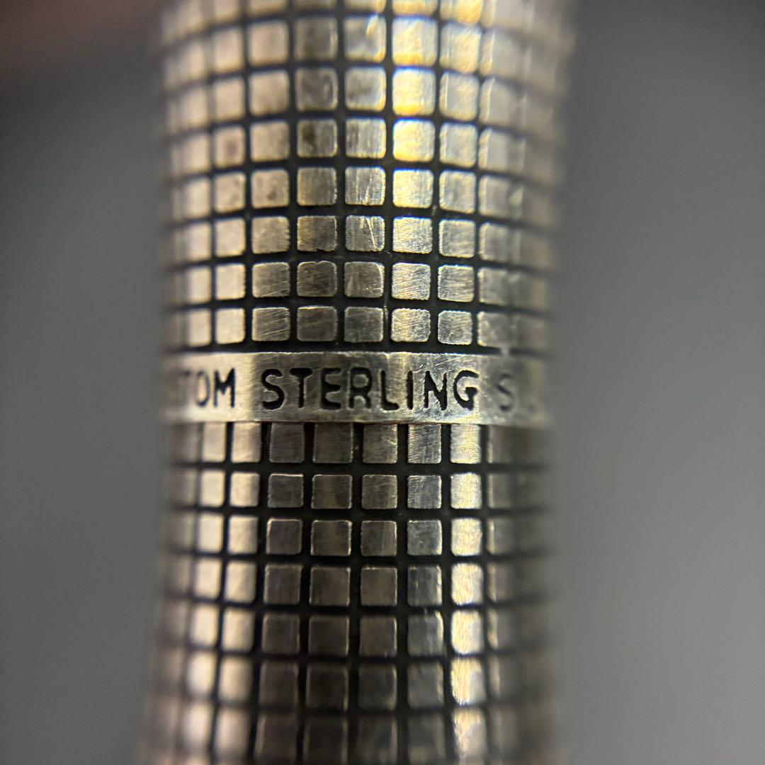 Pilot sterling silver fountain pen with silver body and classic nib shown on white background