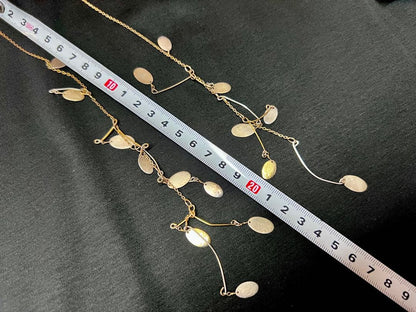 Elegant agate long necklace measuring 88 cm with certificate of sale displayed