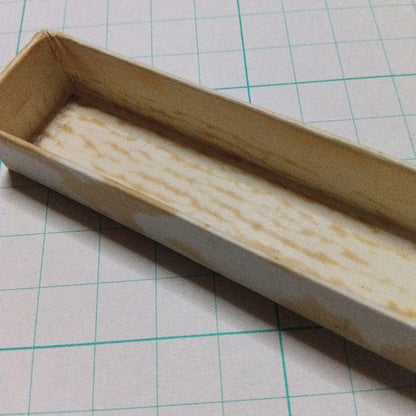 Black Pilot Desk Pen with 14K gold nib showing scratches and discoloration, accompanied by damaged storage box