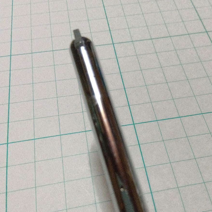 Black Pilot Desk Pen with 14K gold nib showing scratches and discoloration, accompanied by damaged storage box