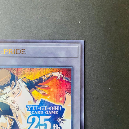 Yugioh Side PRIDE Token card with used serial number in good condition from Quarter Century Chronicle series