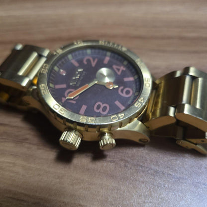 NIXON Gold Quartz Men's Watch — Japanese