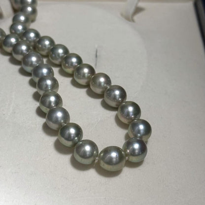 Akoya pearl necklace with blue-grey pearls approximately 9-10mm on a 46cm strand with silver clasp