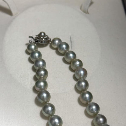 Akoya pearl necklace with blue-grey pearls approximately 9-10mm on a 46cm strand with silver clasp