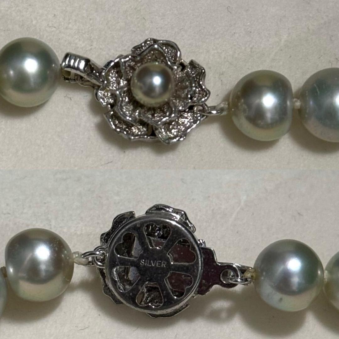 Akoya pearl necklace with blue-grey pearls approximately 9-10mm on a 46cm strand with silver clasp