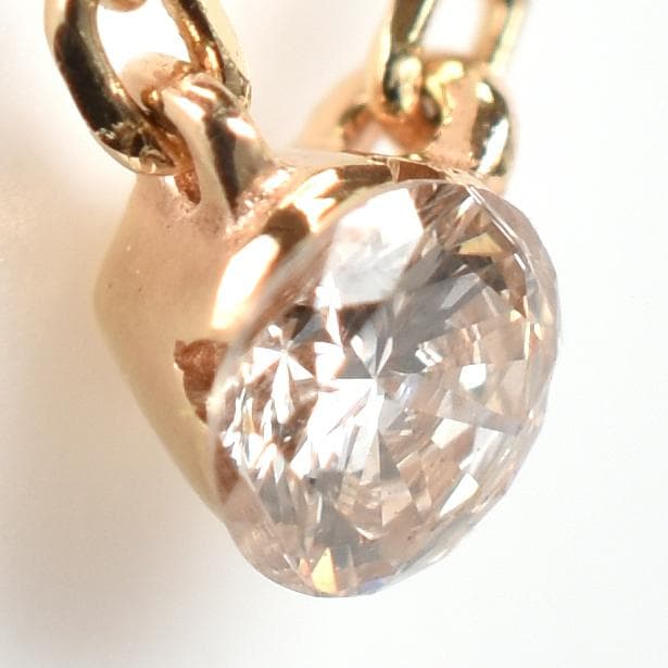 agete Law yellow gold necklace featuring one pearl and a small diamond, 40 cm length with 3 cm adjuster